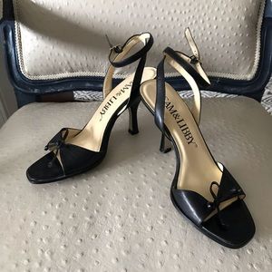 Black heeled ankle strap shoe